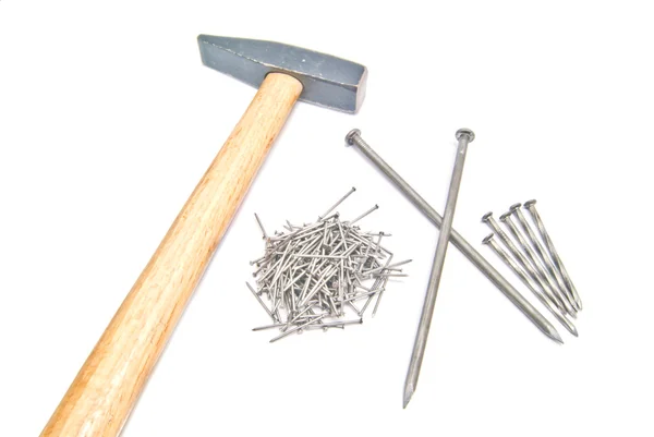 Three different type of nails and hammer — Stock Photo, Image