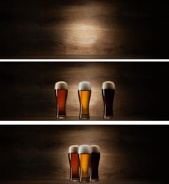 Tree glass beer on wood background with copyspace — Stock Photo, Image