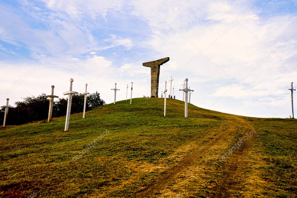  Famous Didgori battle monument with giant swards and sculptures of soldiers close to Tbilisi in Caucasus mountain range