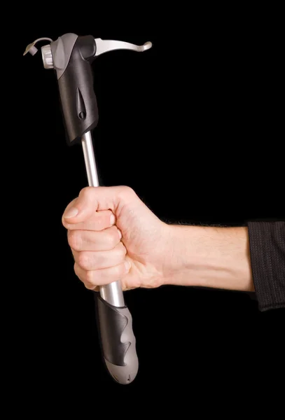 Man's hand holding a pump — Stock Photo, Image