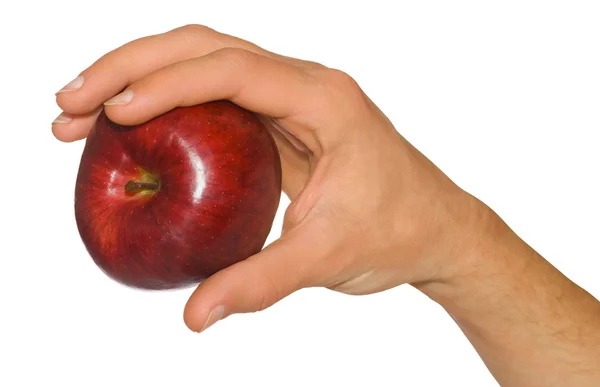 Мужская рука держит яблоко — стоковое фото