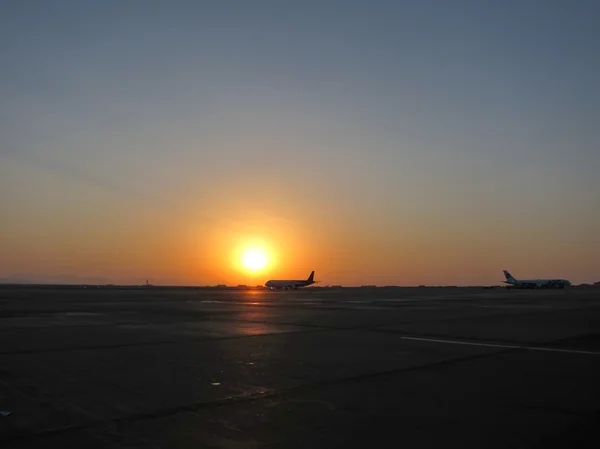 Sunset at takeoff — Stock Photo, Image