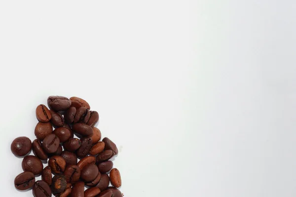 Coffee beans bottom left — Stock Photo, Image