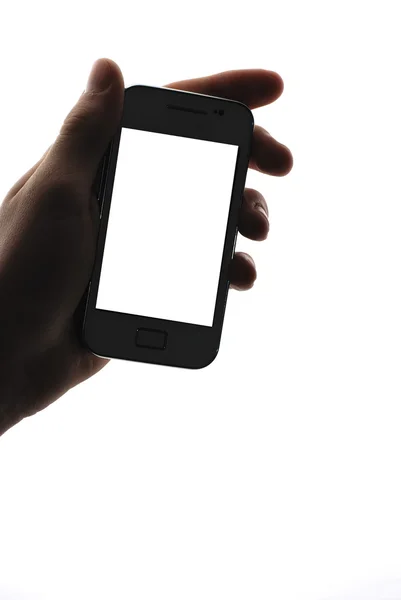 Hand with phone white above — Stock Photo, Image
