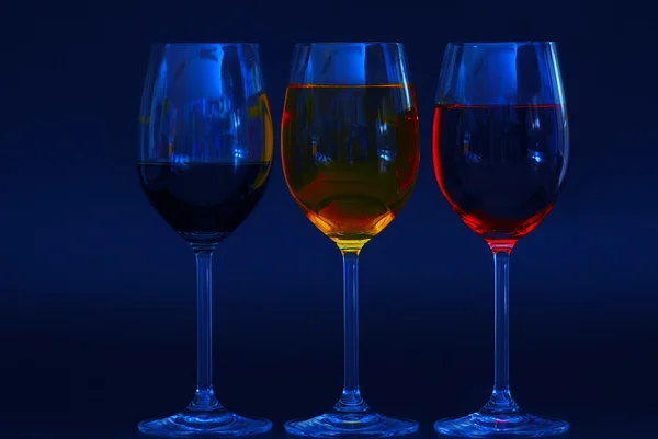 Tre glas fyllda blå — Stockfoto