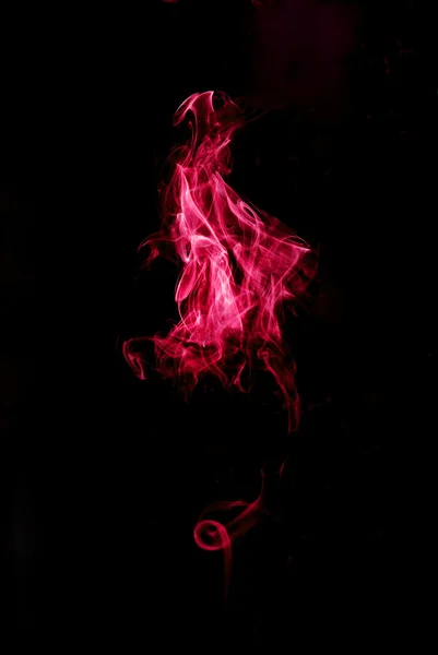 Red smoke on black — Stock Photo, Image