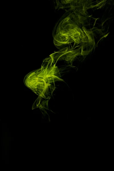 Yellow smoke on black — Stock Photo, Image