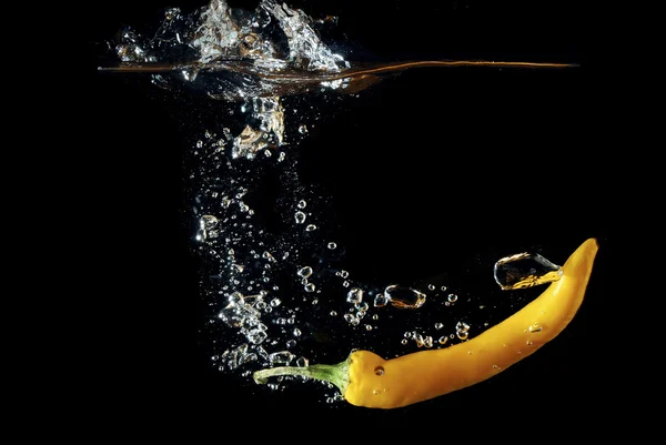 Yellow pepper and bubbles — Stock Photo, Image