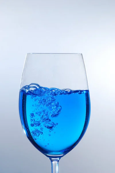 Blue liquid in glass — Stock Photo, Image