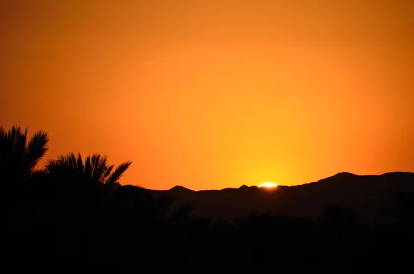 Sunset with mountain — Stock Photo, Image