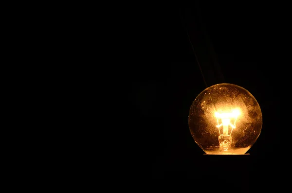 Bulb in darkness — Stock Photo, Image