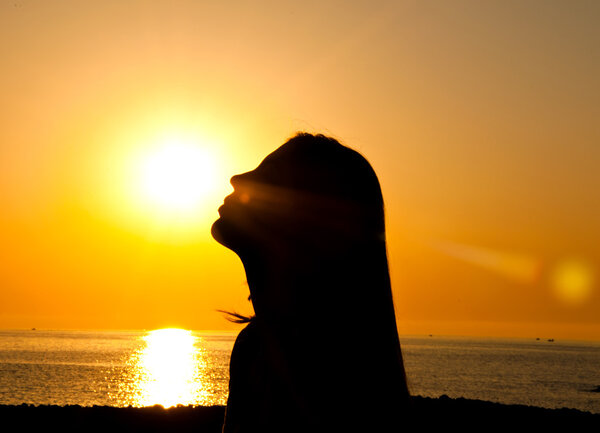  Woman silhouette in the sun