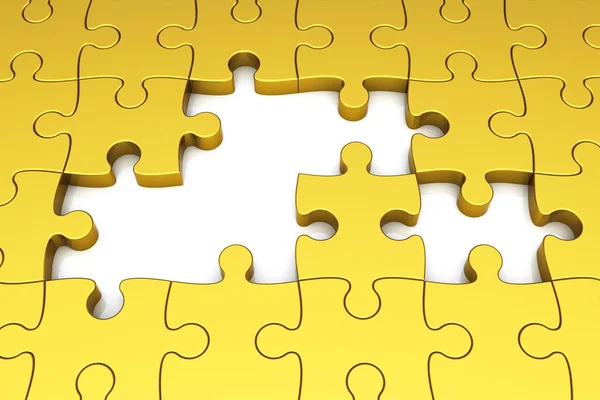 Gold puzzle pieces — Stock Photo, Image