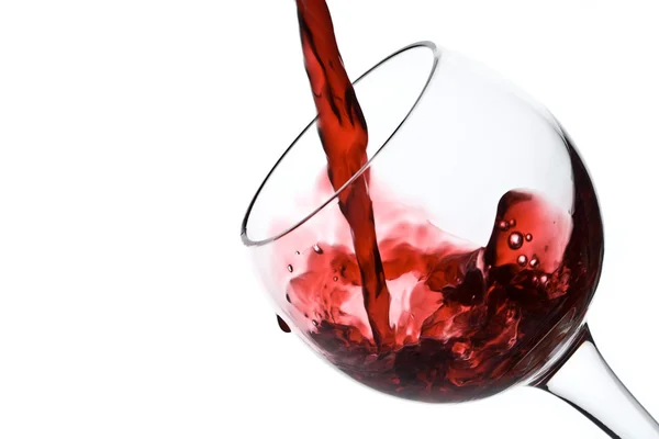 Öntés le egy pohár vörös bor Jogdíjmentes Stock Fotók