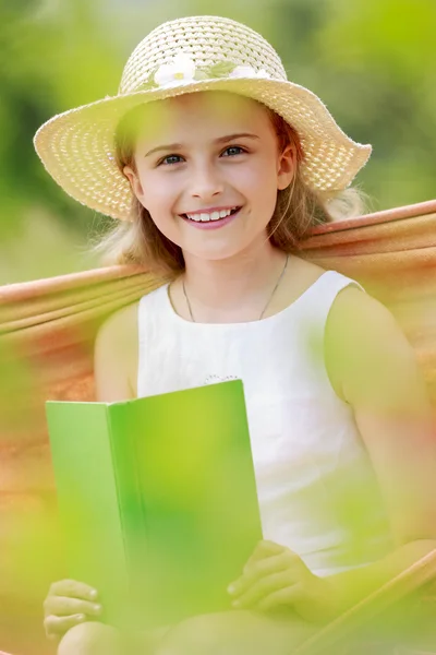 Rest in the garden - lovely girl inl hammock — Stock Photo, Image