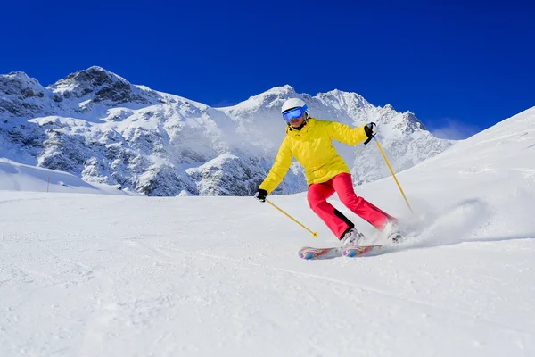 Skiing, skier, winter sport - woman skiing downhill — Stock Photo, Image