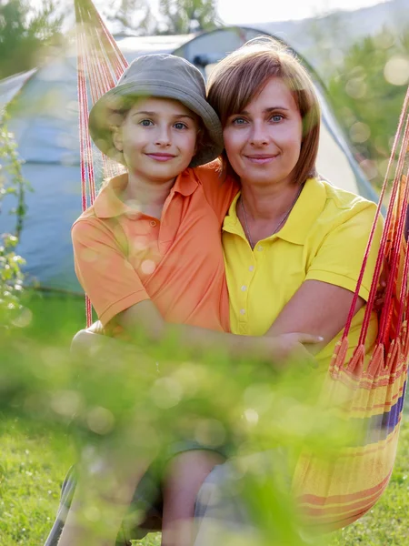 Summer in the tent - young girl with family on the camping — Stock Photo, Image
