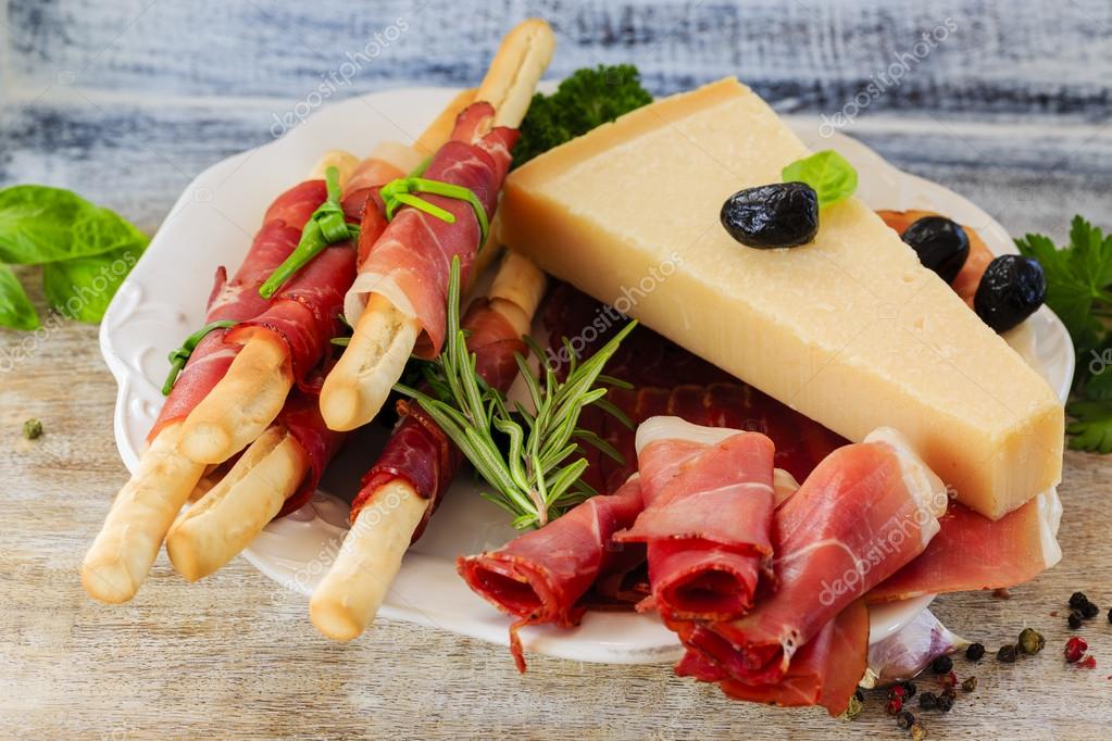 Italian prosciutto di Parma with grissini, Grana Padano Stock Photo by ©Gorilla 46706231