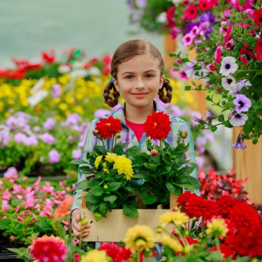 Planting, garden flowers - Lovely girl with flowers clipart