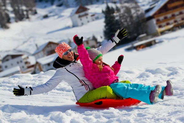 Winter fun, snow, family sledding at winter time — Stock Photo, Image