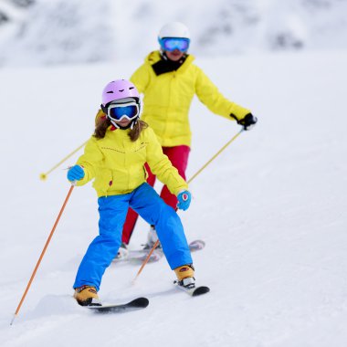 Skiing, skiers on ski run - child skiing downhill, ski lesson clipart