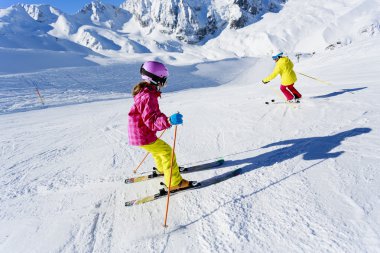 Skiing, skiers on ski run - child skiing downhill, ski lesson clipart