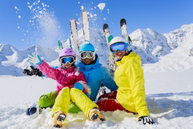 Skiing, winter, snow,  skiers, sun and fun clipart