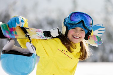 Skiing, skier, winter sports - portrait of happy young skier clipart