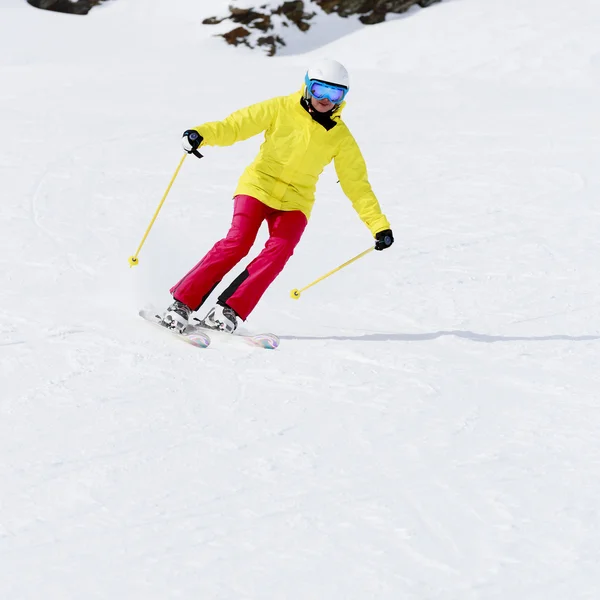 Skiing, skier, winter sport - woman skiing downhill — Stock Photo, Image