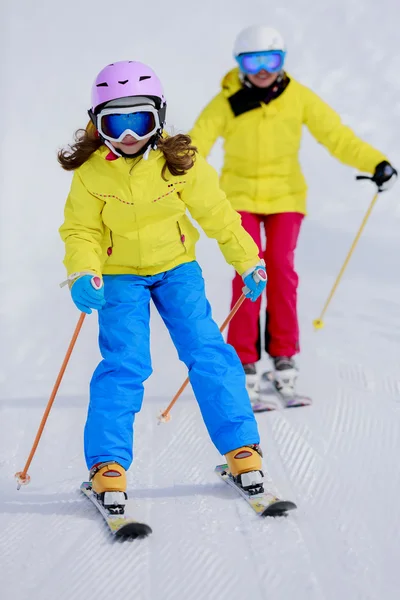 Skiing, skiers on ski run - child skiing downhill, ski lesson — Stock Photo, Image