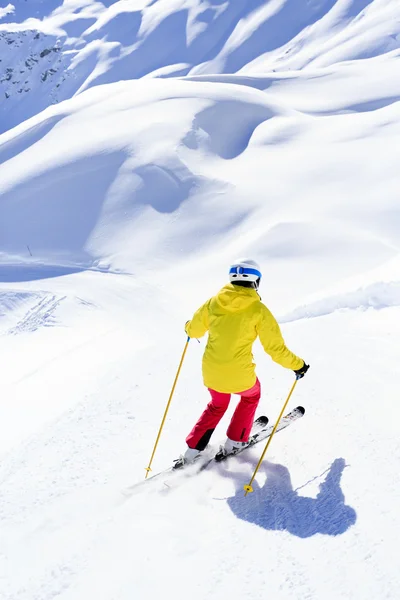 Skiing, skier, winter sport - woman skiing downhill — Stock Photo, Image