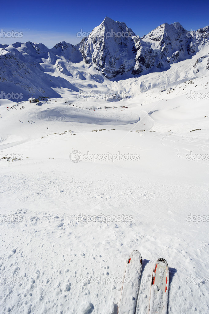 Winter mountains - ski slopes in Italian Alps
