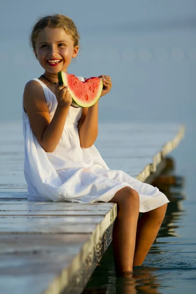 Summer joy, lovely girl eating fresh watermelon on the beach — Stock Photo, Image