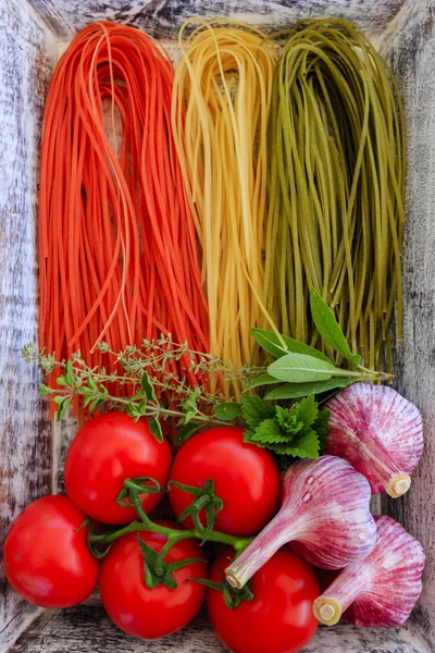 Italian cuisine - Italian tricolor pasta and ingredients
