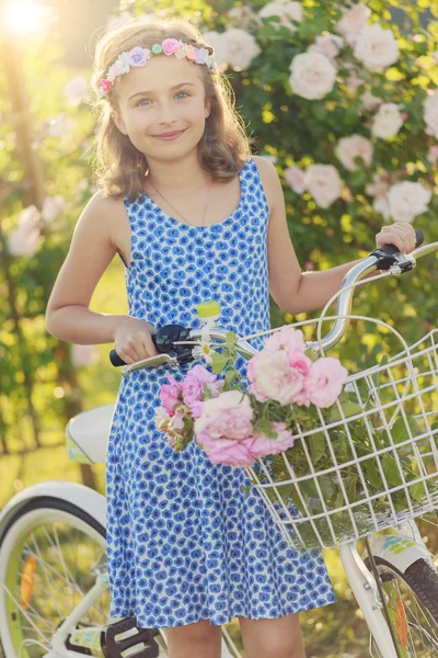 Summer Cycling -  girl with bicycle in summer garden — Stock Photo, Image