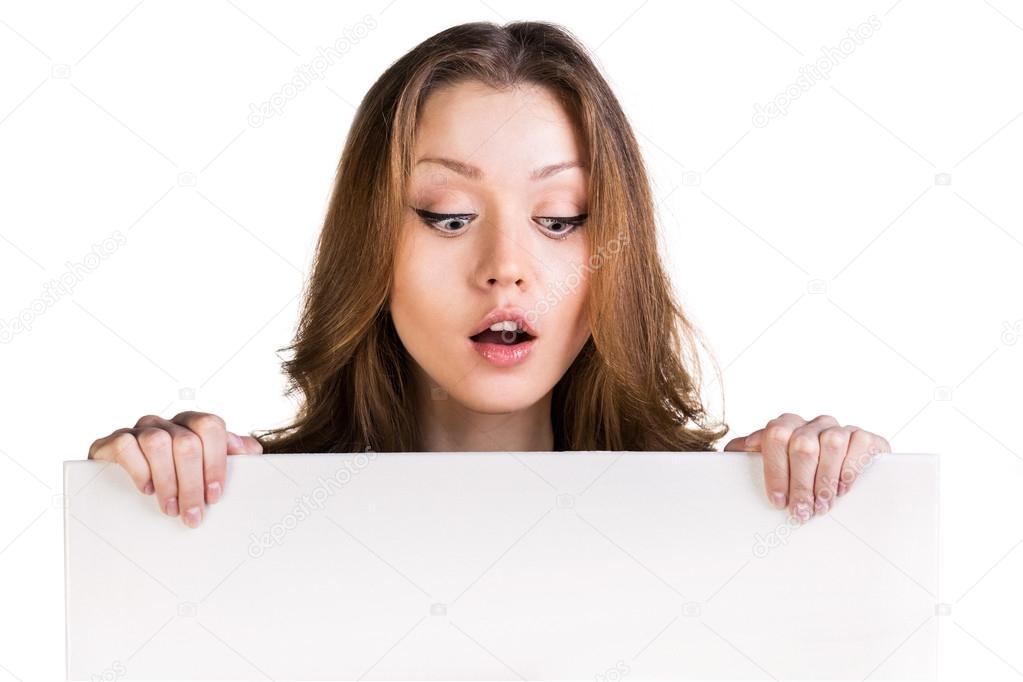 Surprised girl hold white blank card