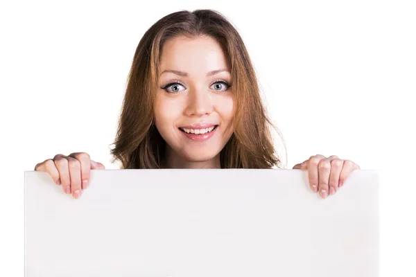 Surprised girl hold white blank card — Stock Photo, Image