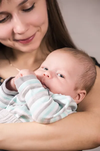 Cheerful young mother and her son — Stock Photo, Image