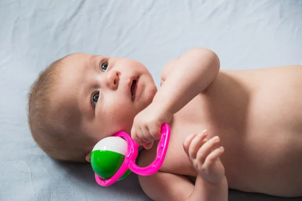 Adorable bebé con juguete —  Fotos de Stock