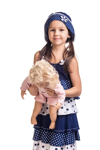 The small beautiful girl with a doll — Stock Photo, Image