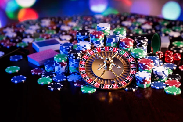 Casino Theme Roulette Wheel Poker Chips Colorful Bokeh Background — Zdjęcie stockowe