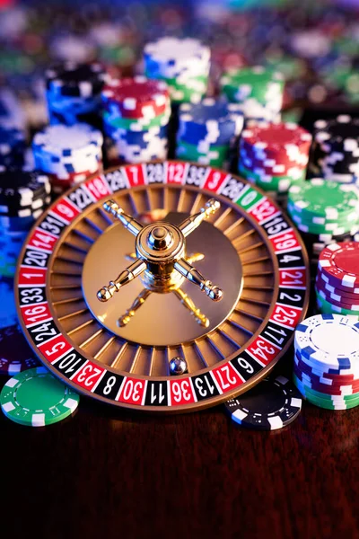 Casino Theme Roulette Wheel Poker Chips Colorful Bokeh Background — Stock Fotó