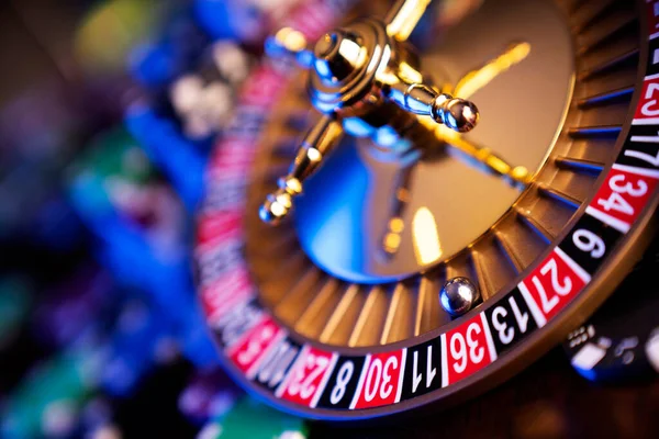 Casino Theme Roulette Wheel Poker Chips Colorful Bokeh Background — Stockfoto