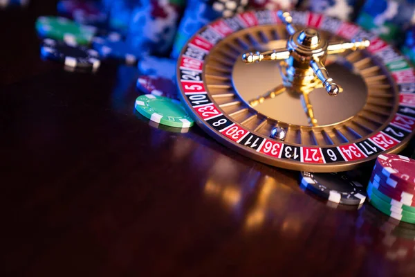 Casino Roulette Wheel Dice Poker Chips Colorful Bokeh Background — Stock Photo, Image