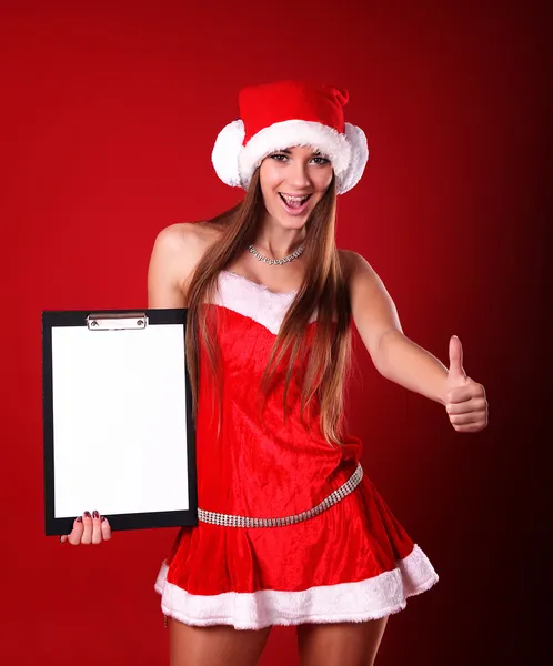 Hübsche junge Frau im Weihnachtsmann — Stockfoto