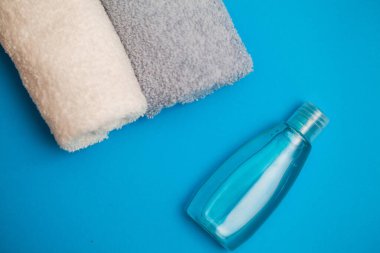 Beautiful composition of spa treatment on blue background.