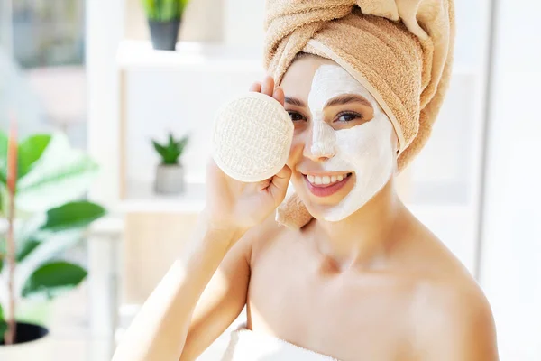 Spa beauty organic facial mask application at day spa home