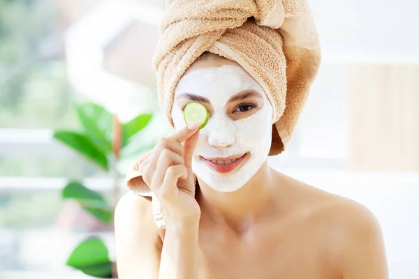 Spa beauty organic facial mask application at day spa home