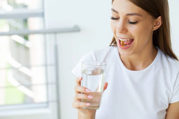 Close Smiling Fitness Woman Taking Pill Cod Liver Oil Omega — Stock Photo, Image