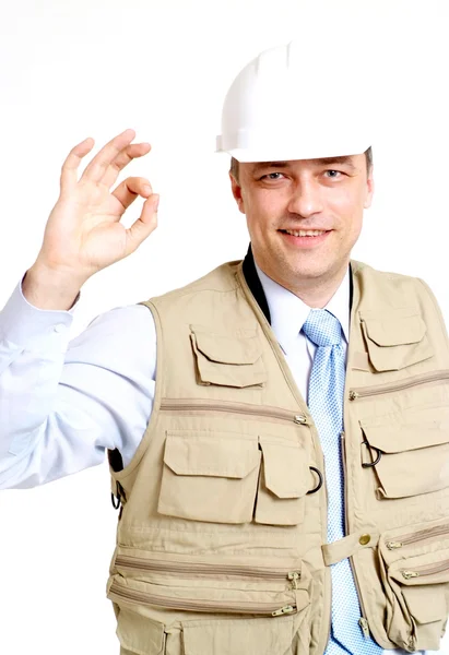 Крутой человек работает в строительном шлеме — стоковое фото